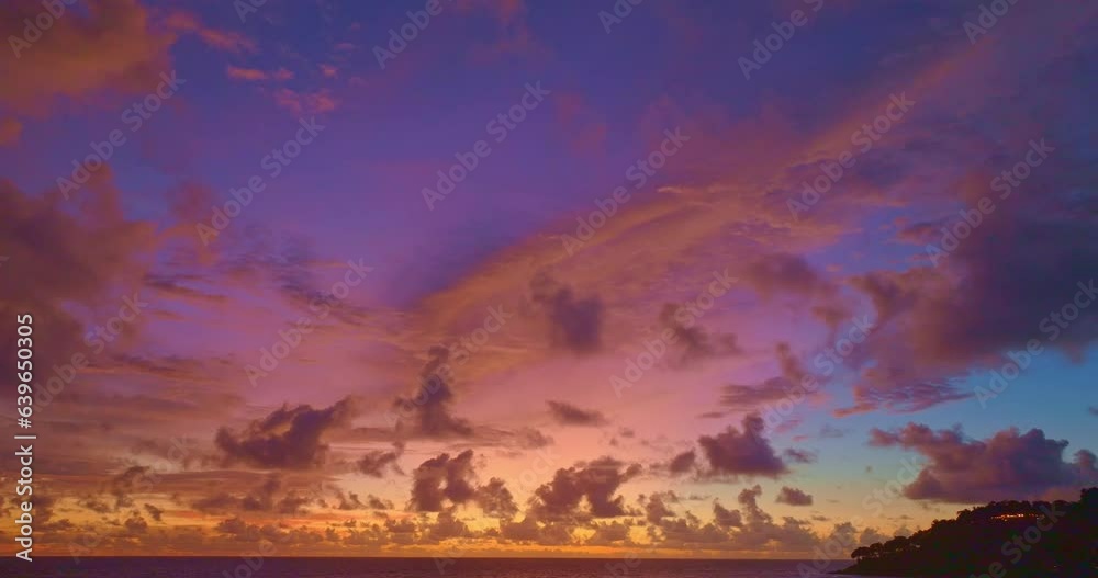aerial view exotic colorful sky in bright sunset at Karon beach Phuket..Scene of colorful romantic sky of sunset. Gradient color. Sky texture..amazing sky of bright sunset in nature and travel aerial view exotic colorful sky in bright sunset at Karon beach Phuket..Scene of colorful romantic sky of sunset. Gradient color. Sky texture..amazing sky of bright sunset in nature and travel