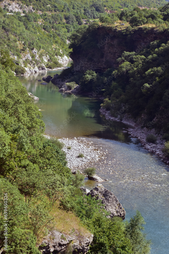 Sunny day in canyon Moraca, Montenegro. River and deep canyon. Nature scenery. Sunny day in canyon Moraca, Montenegro. River and deep canyon. Nature scenery.