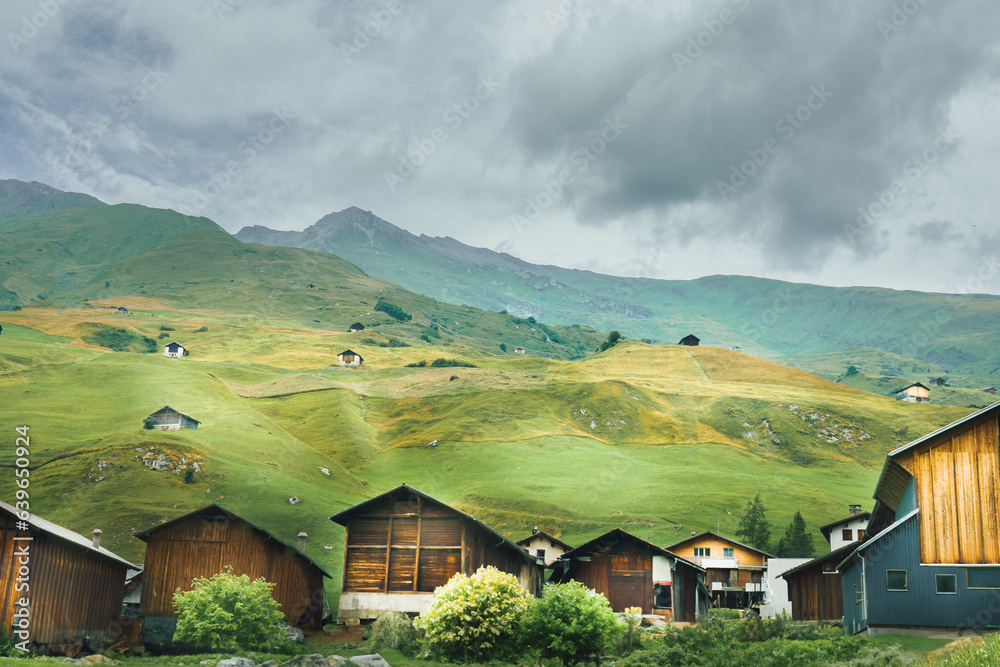 Beautiful mountain landscape in switzerland. Alpine chalets.