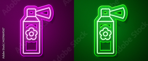 Glowing neon line Air freshener spray bottle icon isolated on purple and green background. Air freshener aerosol bottle. Vector