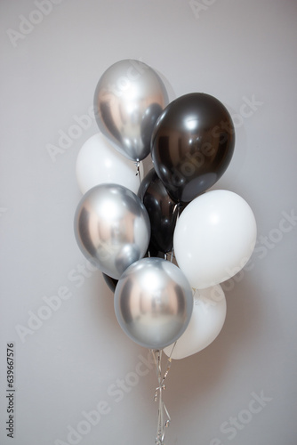 black and white birthday balloons