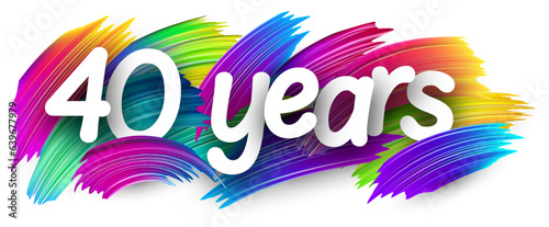 40 years paper word sign with colorful spectrum paint brush strokes over white. Vector illustration.