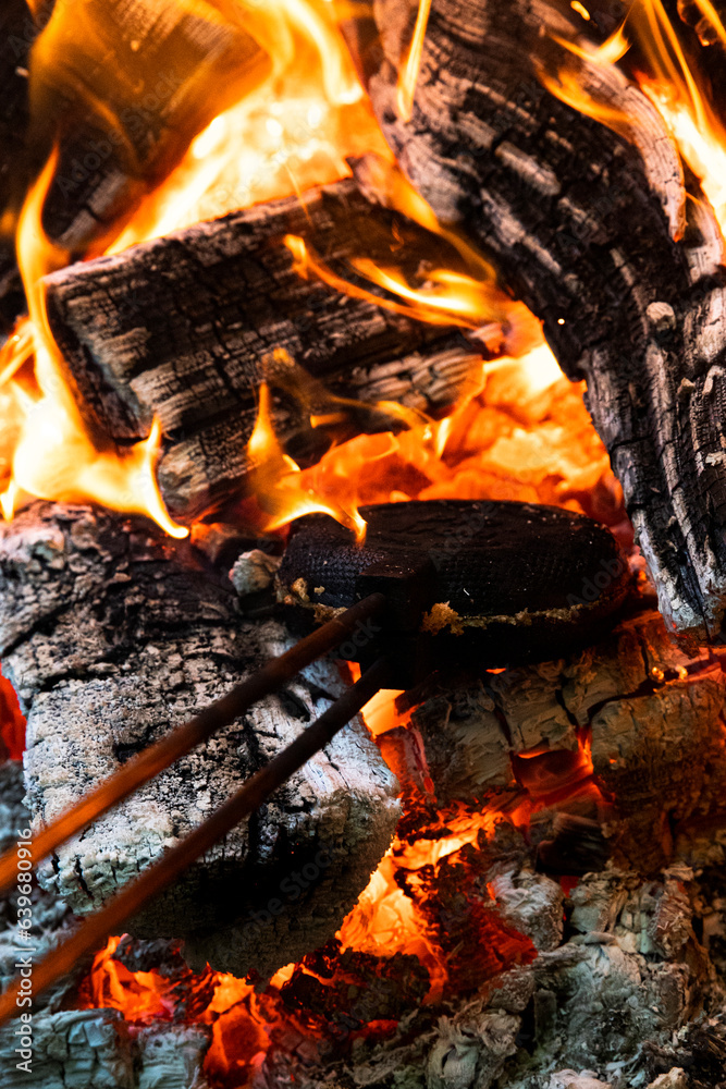 Mountain pie iron in fire: A mouthwatering sight! The aroma of campfire cooking fills the air, enticing taste buds and igniting a sense of outdoor adventure. Mountain pie iron in fire: A mouthwatering sight! The aroma of campfire cooking fills the air, enticing taste buds and igniting a sense of outdoor adventure.