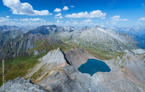 The mountains, lakes, glaciers and landscapes of the upper Blenio Valley, near the village of Campo Blenio, Switzerland - August 2023. photo