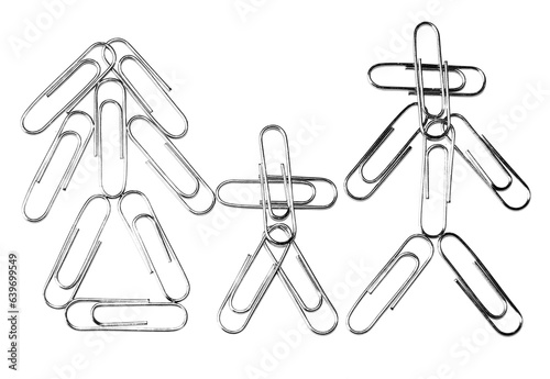 Paperclip family concept close view photo. Paperclip figures isoaled over white background. Family relations conceptual photo photo