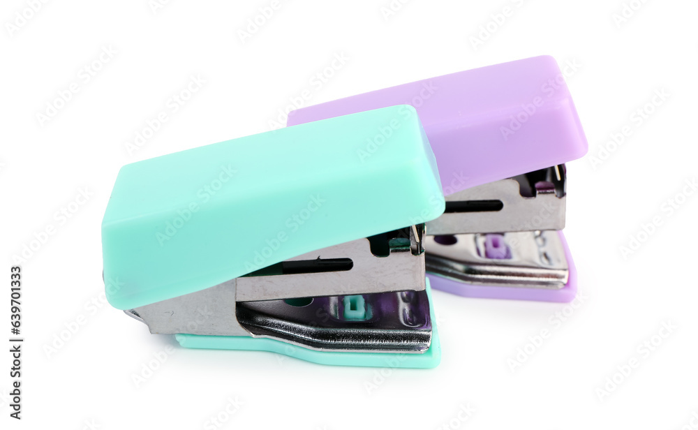 Colorful office isolated staplers on white background Colorful office isolated staplers on white background