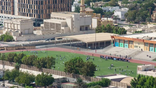 sunny day dubai city crowded sport stadium rooftop panorama 4k timelapse uae 