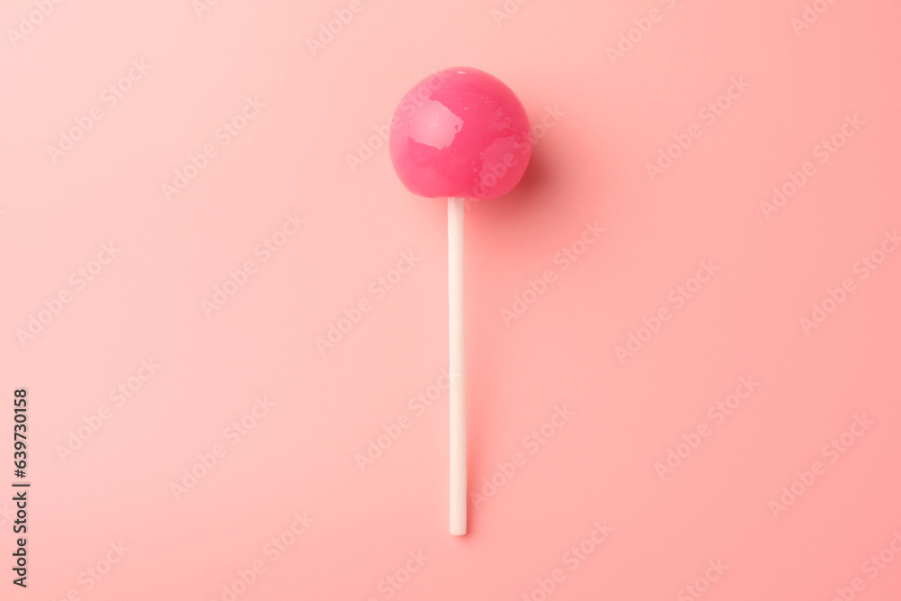 Tasty lollipop on pink background, top view Tasty lollipop on pink background, top view
