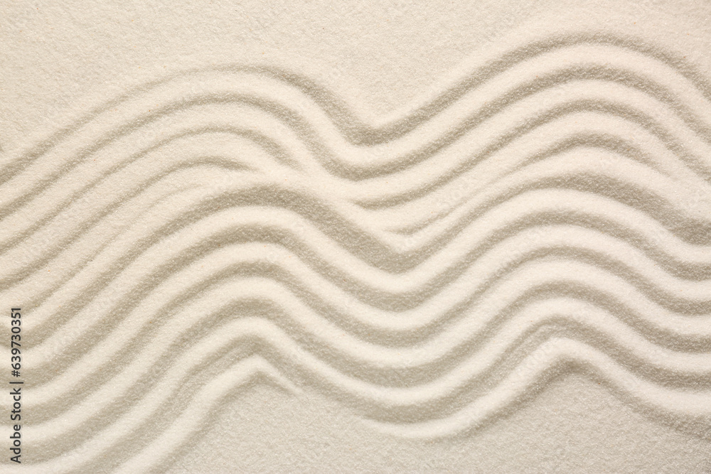White sand with pattern as background, top view. Zen concept White sand with pattern as background, top view. Zen concept