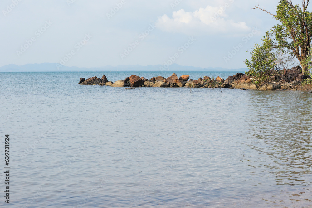 Beautiful scenery and sand beach with sea waves. Clear water of sea waves on the beautiful beach at Koh Chang Islands,Thailand. Beautiful scenery and sand beach with sea waves. Clear water of sea waves on the beautiful beach at Koh Chang Islands,Thailand.