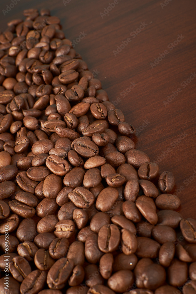 Aromatic Elegance: A close-up masterpiece capturing the intricate details of coffee beans on a rich wooden texture. The interplay of texture and aroma unfolds against a warm backdrop Aromatic Elegance: A close-up masterpiece capturing the intricate details of coffee beans on a rich wooden texture. The interplay of texture and aroma unfolds against a warm backdrop