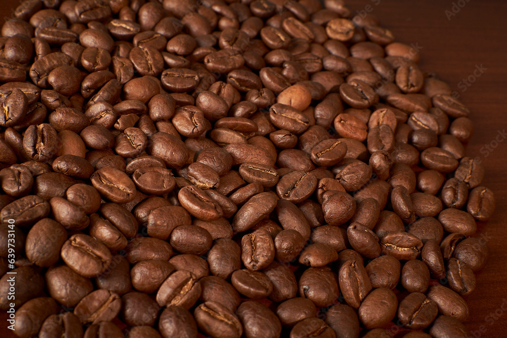 Aromatic Elegance: A close-up masterpiece capturing the intricate details of coffee beans on a rich wooden texture. The interplay of texture and aroma unfolds against a warm backdrop Aromatic Elegance: A close-up masterpiece capturing the intricate details of coffee beans on a rich wooden texture. The interplay of texture and aroma unfolds against a warm backdrop