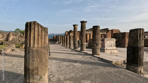 Famous ancient city of Pompeii (Scavi di Pompei) near Naples. Roman period historical ruins and stone footpath walkways of the ancient city. Italy