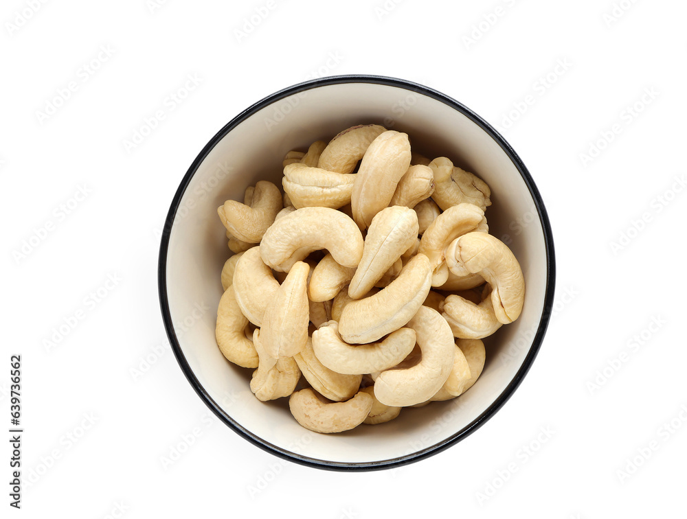 Close up of Fresh tasty cashew nuts in bowl on white background. Top view and clipping path.