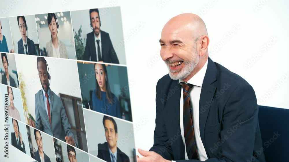 Middle aged businessperson taking video conference with hologram screen. Middle aged businessperson taking video conference with hologram screen.