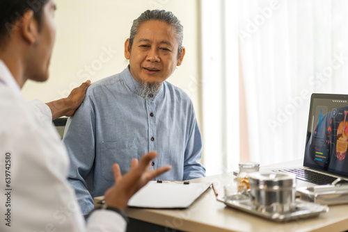 Asian man doctor service help support discussing and consulting talk to asian sick senior man patient at meeting health medical care trust concept in hospital.healthcare and medicine © Art_Photo