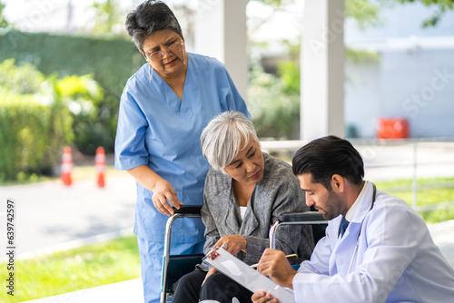 Man doctor with stethoscope service help support discussing and consulting care talk to sick senior asian woman patient in hospital,caregiver,elderly,recovery,illness insurance.healthcare and medicine © Art_Photo