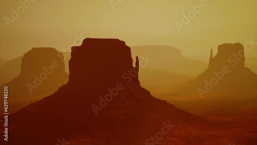 Sunset at the sisters in Monument Valley