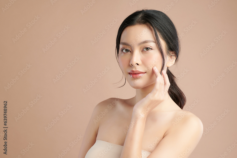Beautiful young asian woman with clean fresh skin on beige background, Face care, Facial treatment, Cosmetology, beauty and spa, Asian women portrait. Beautiful young asian woman with clean fresh skin on beige background, Face care, Facial treatment, Cosmetology, beauty and spa, Asian women portrait.