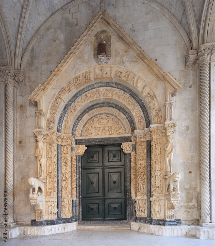 Roman Catholic Basilica entrance in in Trogir, Croatia 