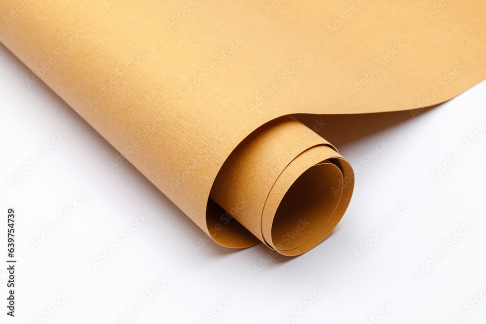 close up of rolled up brown Washable kraft paper on white background with copy space	