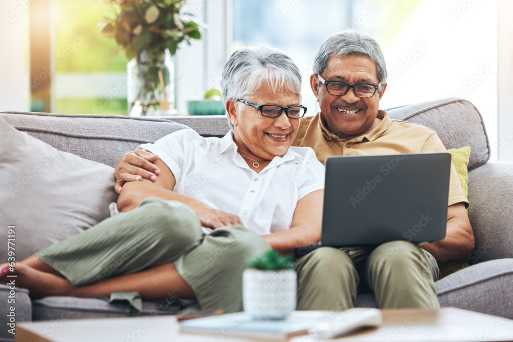 Laptop, happy and senior couple on sofa for watching movies, entertainment and streaming in living room. Retirement, love and man and woman relax on computer for internet, website and online at home Laptop, happy and senior couple on sofa for watching movies, entertainment and streaming in living room. Retirement, love and man and woman relax on computer for internet, website and online at home