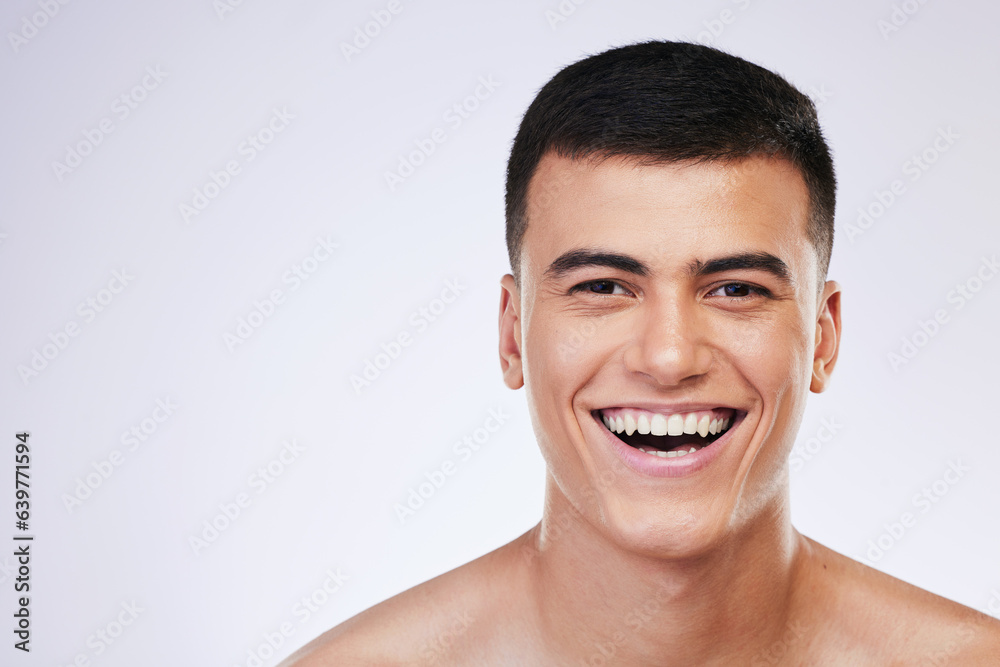 Man, smile portrait and skincare with facial and beauty treatment for skin glow and wellness in studio, Happy male model, dermatology and cosmetics for face with white background and mockup space Man, smile portrait and skincare with facial and beauty treatment for skin glow and wellness in studio, Happy male model, dermatology and cosmetics for face with white background and mockup space