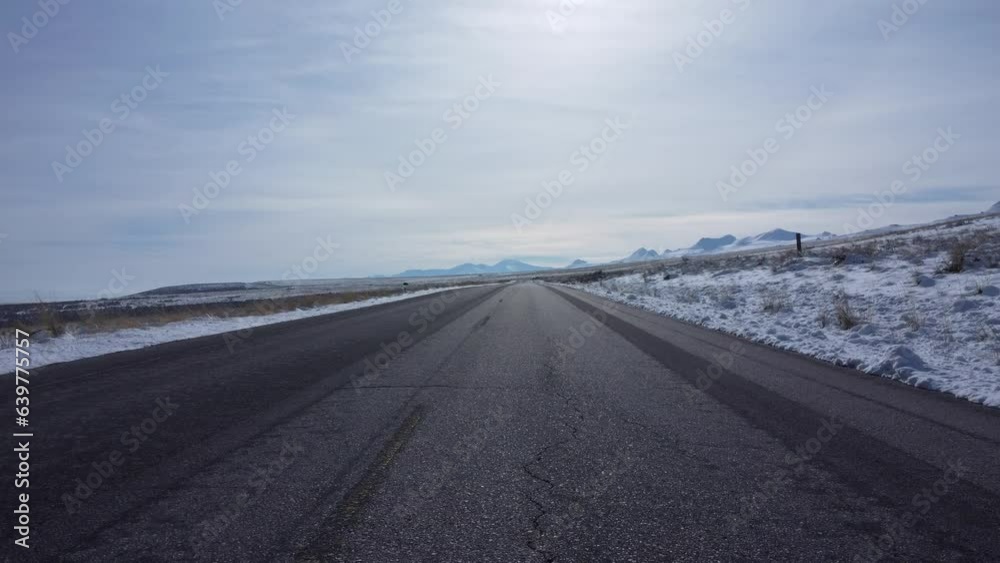 A road in winter season in the middle of Utah A road in winter season in the middle of Utah