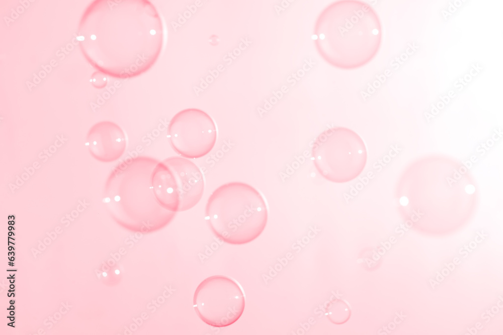 Refreshing of Soap suds, Bubbles Water. Beautiful Transparent Pink Soap Bubbles Floating in The Air. Abstract Background, Pink Textured, Celebration Festive Romance Backdrop.