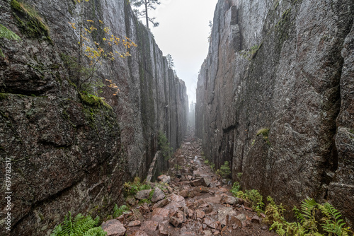 Slattdalsskrevan Canyon in Skuleskogen National Park Narrow crevasse in solid rock Hiking High Coast Trail in Sweden
