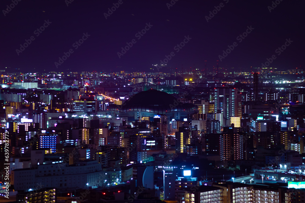 A night cityscape by high angle view near Kyocera dome in Osaka telephoto shot