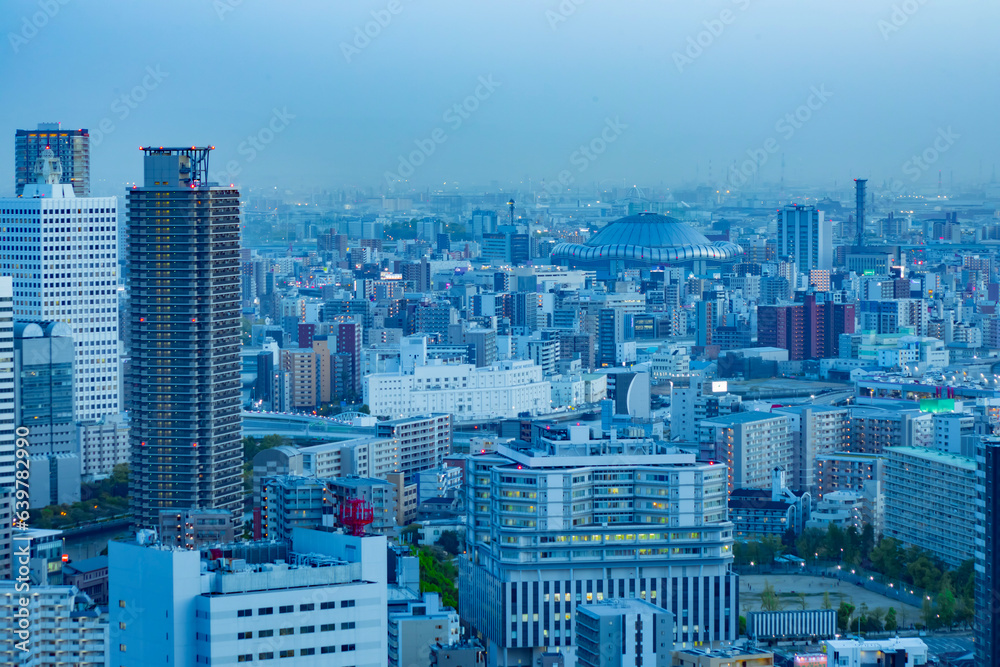 A dusk cityscape by high angle view near Kyocera dome in Osaka 