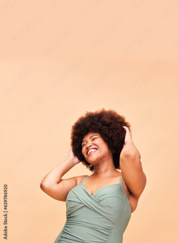 Black woman, swimwear and self love, smile and confident with body positivity in studio on peach background mockup space. Happy, person and girl in natural beauty and face for freedom in swimsuit Black woman, swimwear and self love, smile and confident with body positivity in studio on peach background mockup space. Happy, person and girl in natural beauty and face for freedom in swimsuit