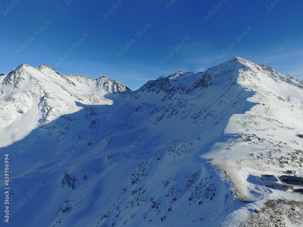 Mountain, snow and the Swiss Alps in winter for freedom, holiday or vacation with a view of nature. Environment, landscape and travel in a remote location during the cold weather season in Europe