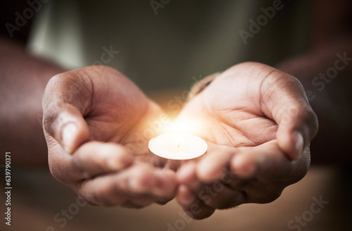 Prayer, candle or hands of man for worship, faith and belief for support, help and hope in Christian religion. Light, closeup or person in meditation for spiritual healing, mercy or trust for praise