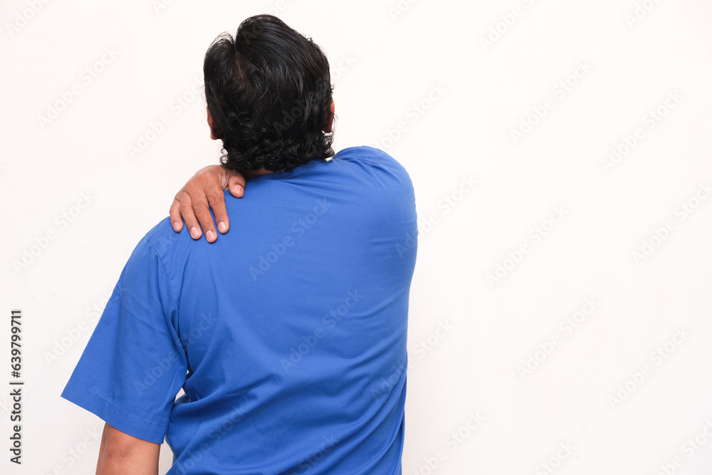 asian man expression feeling shoulder pain isolated white background asian man expression feeling shoulder pain isolated white background