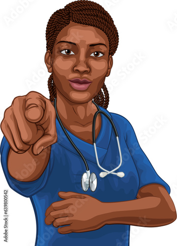 A black woman doctor or nurse medical healthcare health professional in scrubs pointing in a classic needs you pose