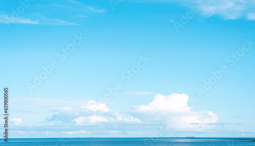 Sky blue with cloud background,Horizon clear summer sky with fluffy white cloud over tropical sea beach,Beautiful Nature landscape picturesque banner for World environment day,Earth day