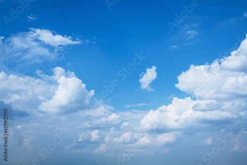 Fototapeta Naklejka Na Ścianę i Meble -  Bright blue sky with cumulus and cirrocumulus clouds, day 
