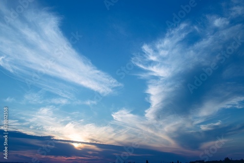 Colorful blue sky at sunset with beautiful clouds, Ukrainian landscape