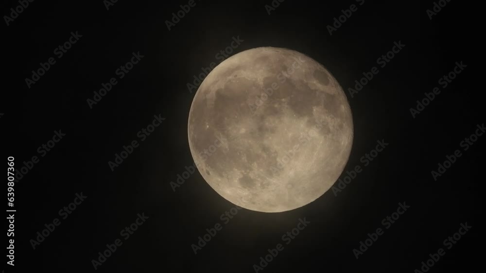 Full Moon with clouds ,close up view Full Moon with clouds ,close up view