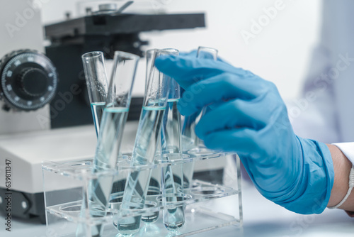 Image of a researcher's hands testing water quality in a lab.Effects of Water Pollution on Human Health and Disease