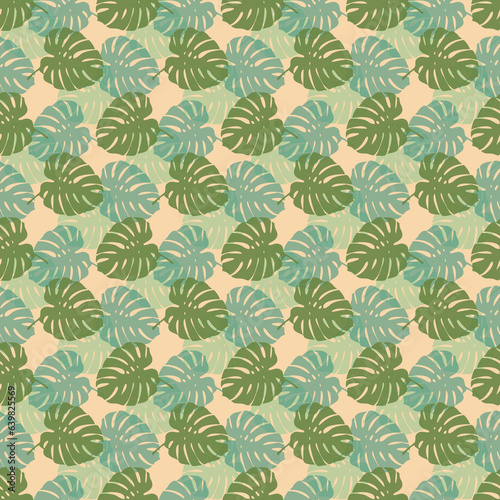 Tropical leaves seamless pattern of Monstera philodendron leaves in green color tone, tropical background.