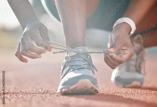Quadro su tela Shoes, hands and tie lace, running and fitness with person on race track, athlete and sports outdoor