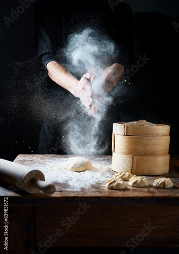 Fotografie Dim sum in preparation by male chef