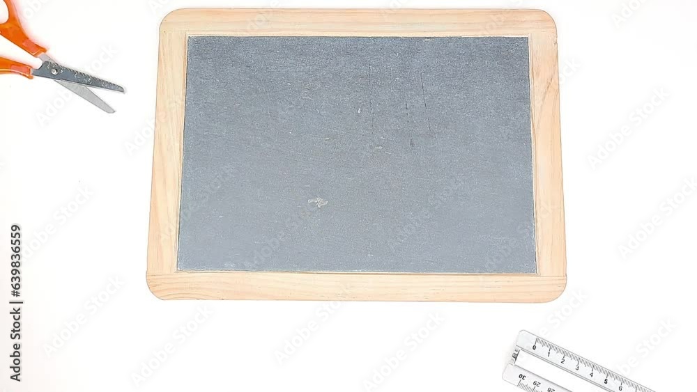 Stationery for school, pastels, ruler, tempera and slate board. Top view, copy space. Stationery for school, pastels, ruler, tempera and slate board. Top view, copy space.