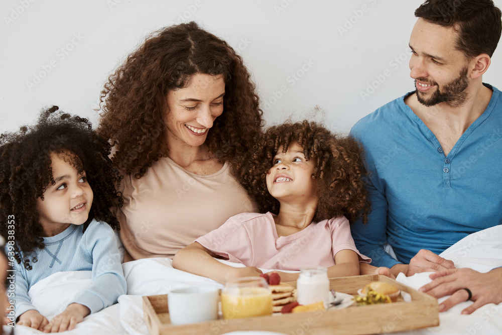 Parents, children and happy family breakfast in bed, eating food and rest together, bond and relax in apartment. Home bedroom, morning meal and interracial kids, mom and dad wellness, love and care Parents, children and happy family breakfast in bed, eating food and rest together, bond and relax in apartment. Home bedroom, morning meal and interracial kids, mom and dad wellness, love and care