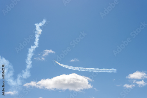 aviation show with bowl of smoke in the sky