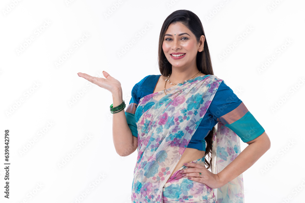 Traditional Indian woman showing open hand palm Traditional Indian woman showing open hand palm
