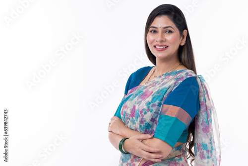 Portrait of smiling woman in traditional Indian sari isolated on white background